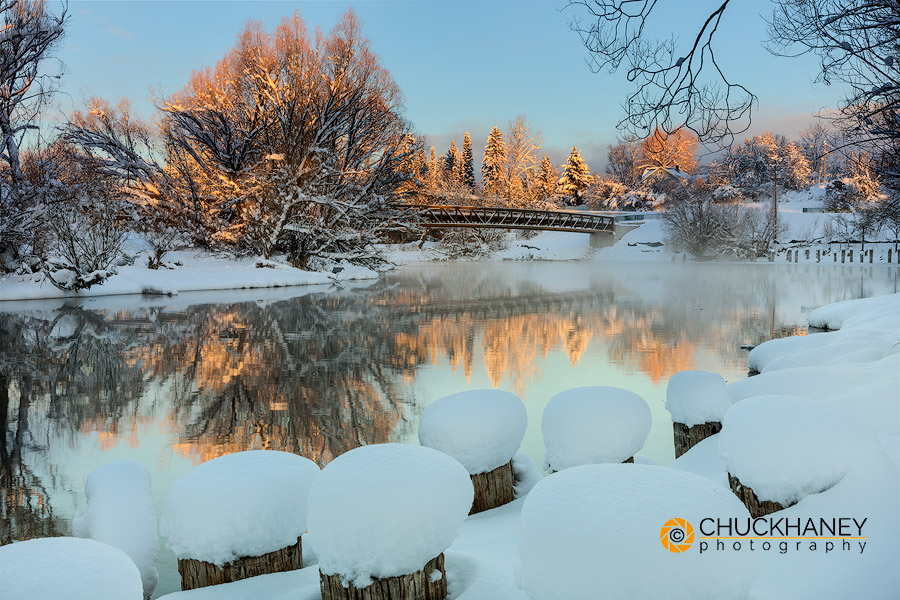 Footbridge over the Whitefish River after a fresh snowfall in Whitefish, Montana, USA