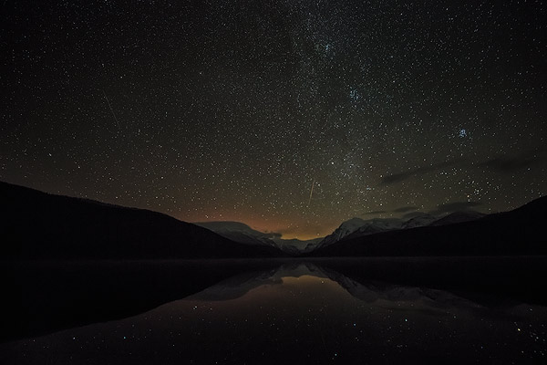 Starry skies over Bowman Lake in Glacier National Park, Montana