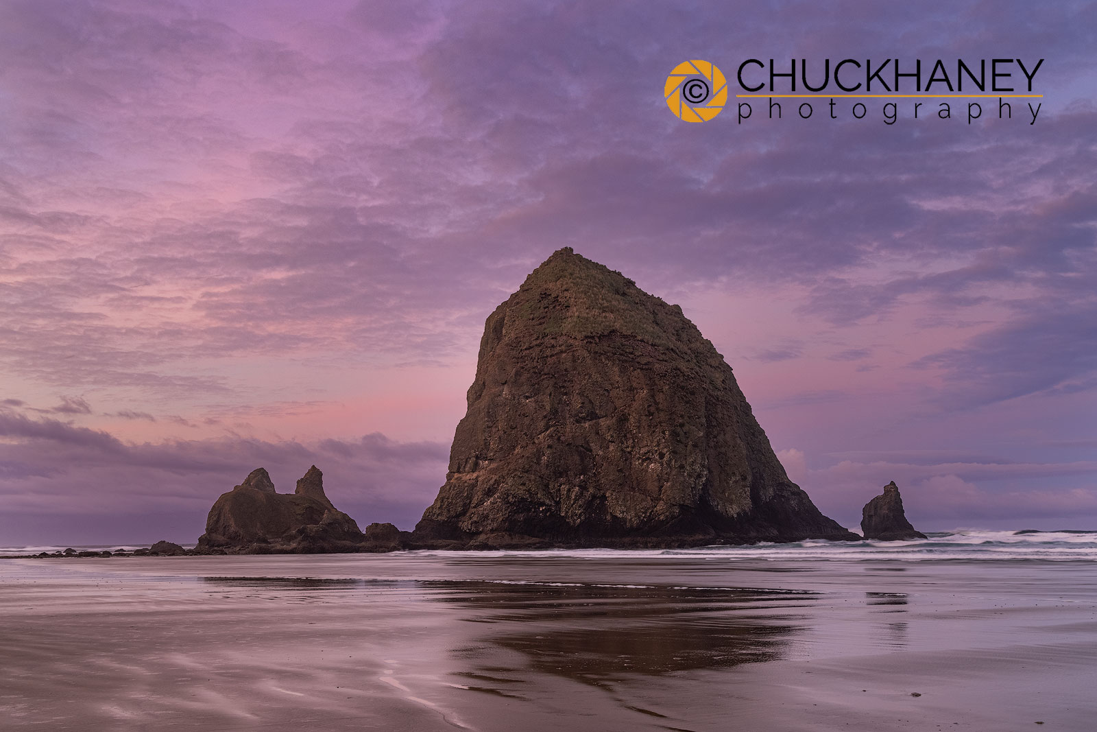 Sunrise clouds over Haystack Rock in Cannon Beach, Oregon, USA Colorful autumn maples along Humbug Creek in Clatsop County, Oregon, USA